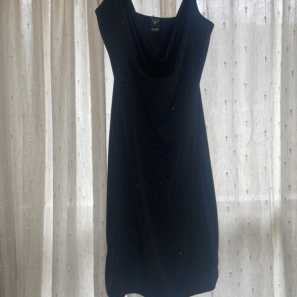 The perfect little black dress with a subtle sparkle